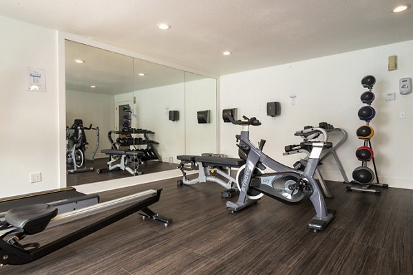 State-of-the-art fitness center at Sedona at Bridgecreek Apartments, featuring modern equipment for residents' wellness and exercise needs