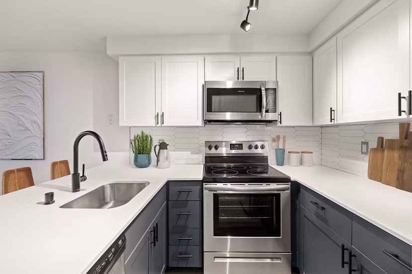 Modern kitchen featuring stainless steel appliances in Sedona at Bridgecreek Apartments