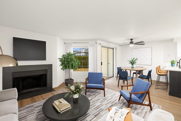 Inviting living room with modern decor at Sedona at Bridgecreek Apartments, offering luxury living in a vibrant community