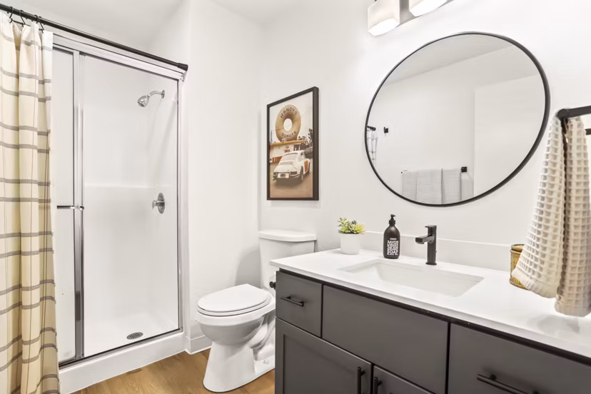 Bathroom featuring sleek fixtures and modern design at Silver Oak Apartments