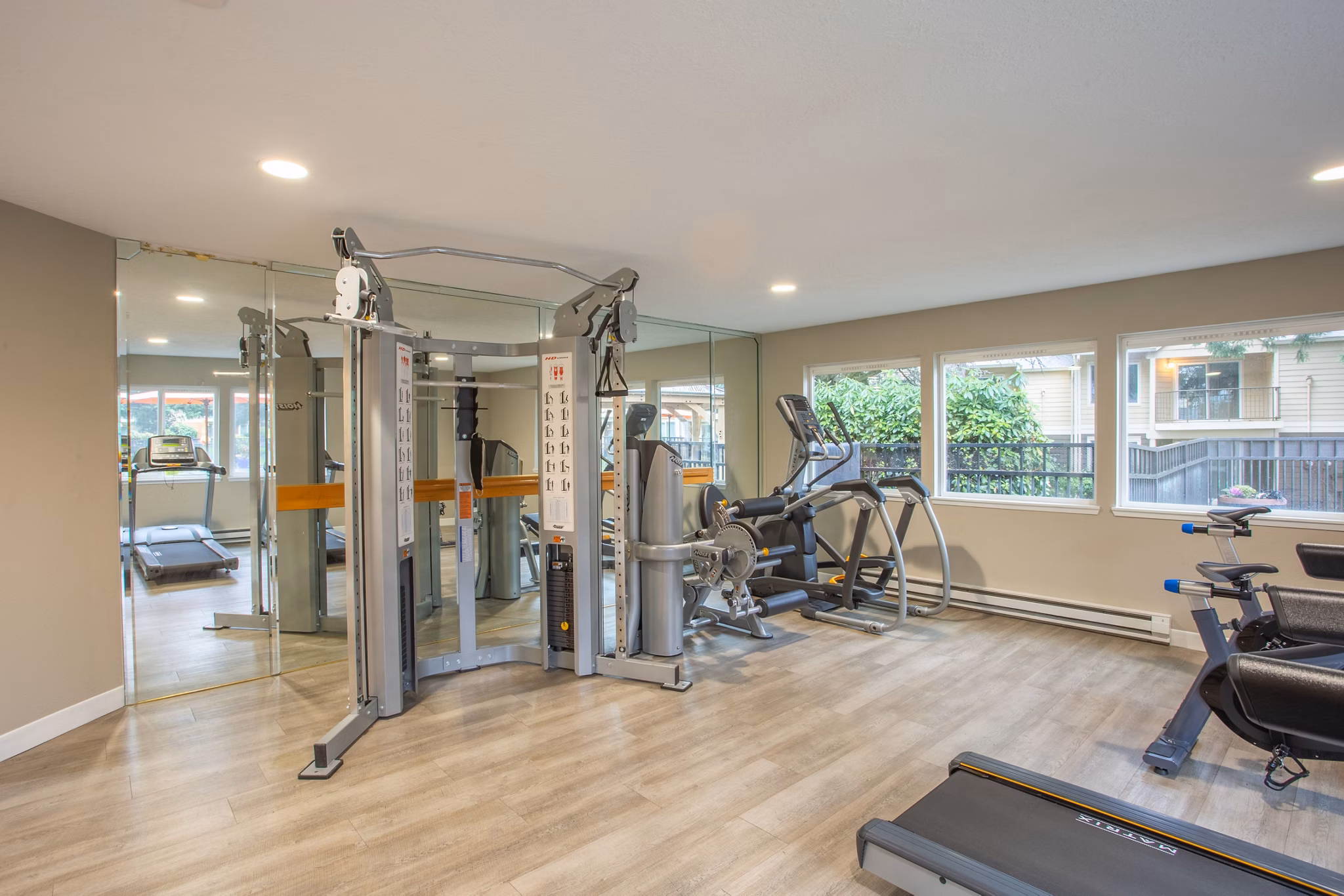 Modern fitness center with state-of-the-art equipment at Silver Oak Apartments