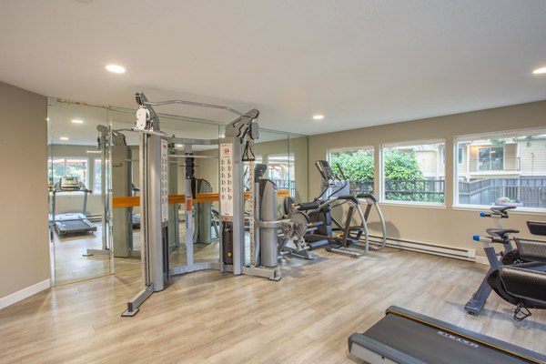 Modern fitness center with state-of-the-art equipment at Silver Oak Apartments