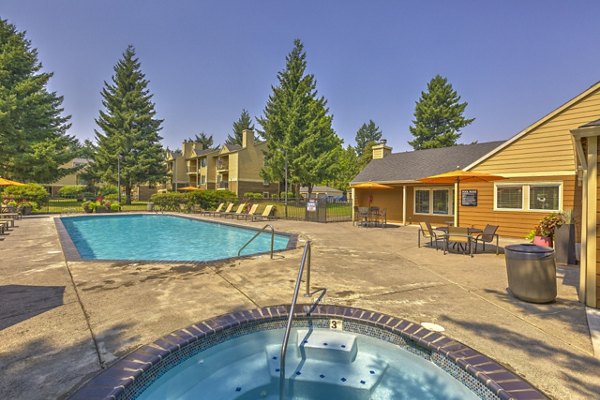Resort-style pool at Silver Oak Apartments offering luxury relaxation in a serene setting