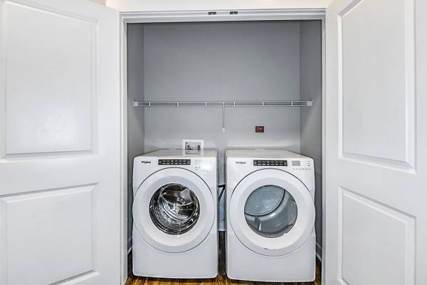 laundry room at The Residences at SweetBay Apartments