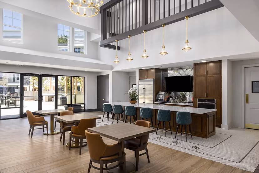 Clubhouse with modern furnishings at Overture Tributary Apartments, a Greystar community