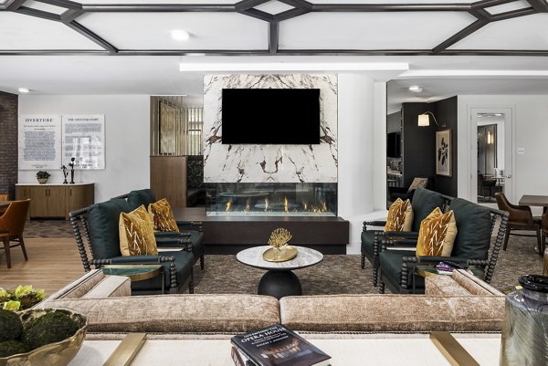 Clubhouse featuring modern decor and seating areas at Overture Tributary Apartments, for luxury living and community events