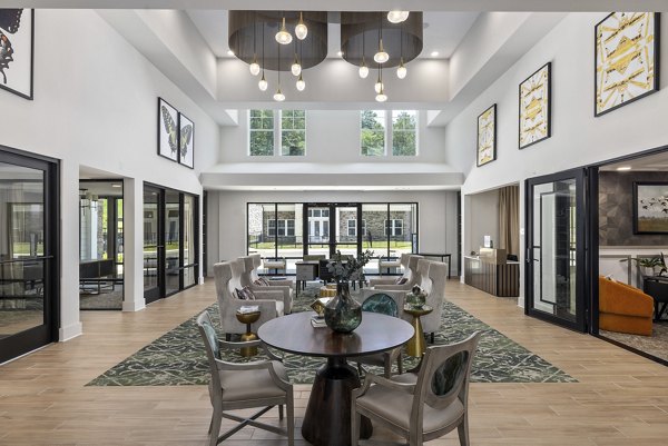 Contemporary clubhouse with stylish decor at Overture Tributary luxury apartments in vibrant community setting