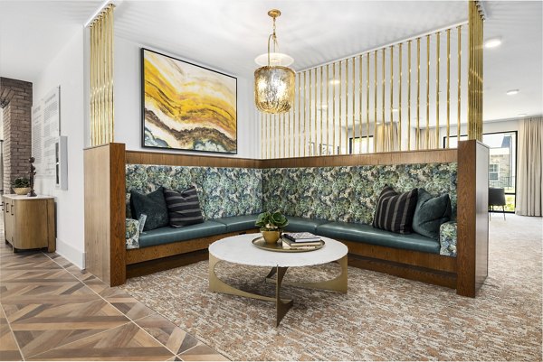 Clubhouse at Overture Tributary: Elegant social space with modern furnishings and large windows for a luxurious lifestyle