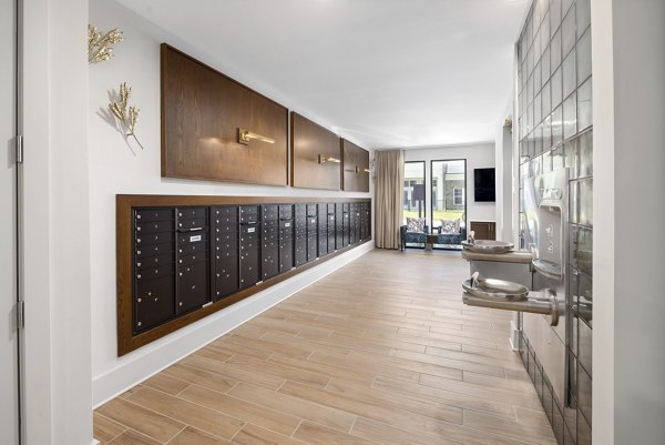 Mailroom with secure package lockers at Overture Tributary Apartments