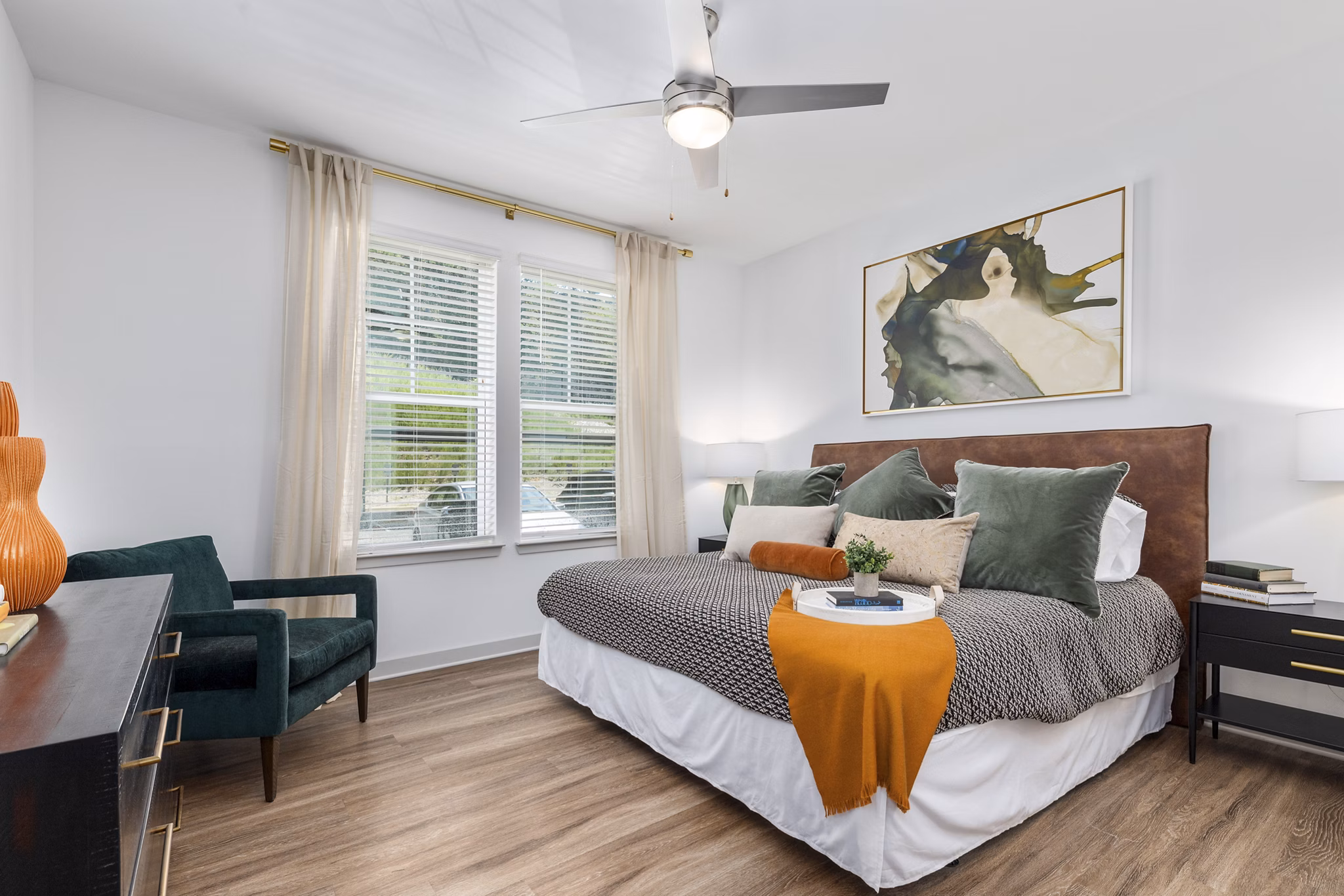 Modern bedroom with elegant decor at Overture Tributary Apartments