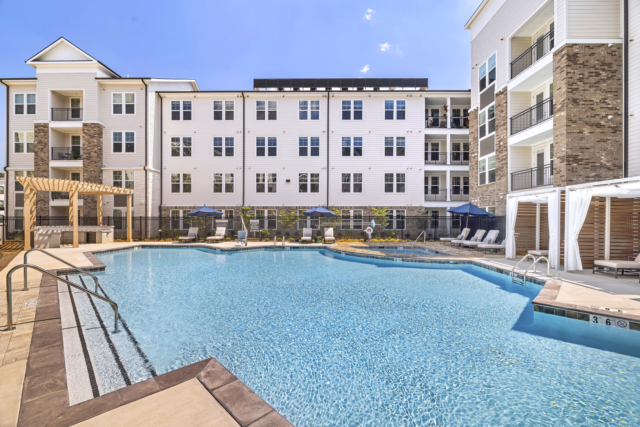 Luxurious outdoor pool at Overture Tributary Apartments, ideal for relaxation and recreation