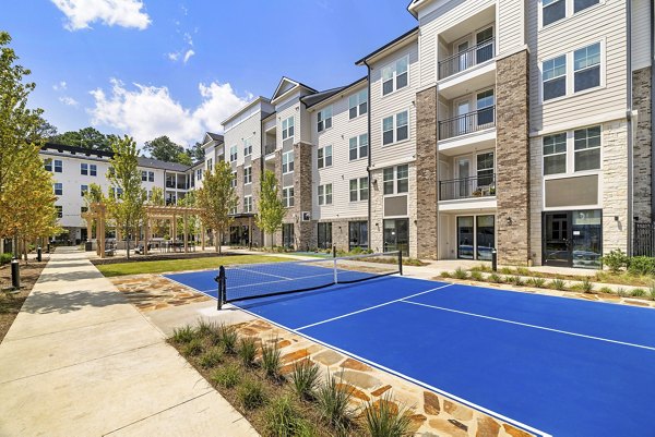 Outdoor sport court featuring multi-use play area at Overture Tributary Apartments