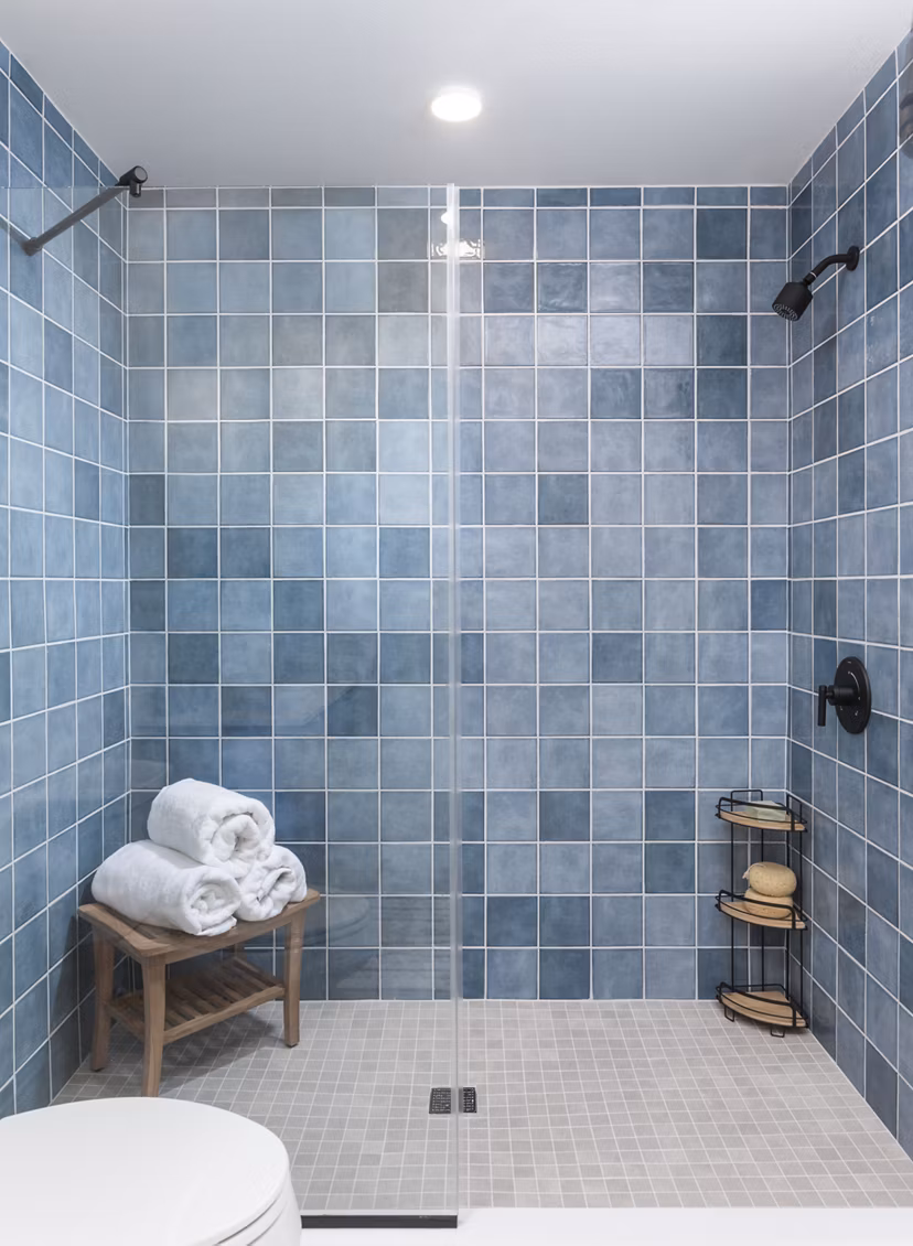 Bathroom featuring elegant fixtures and a spacious vanity at The Charlie SM C&B Apartments