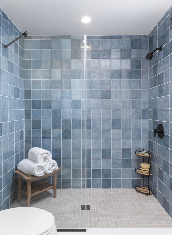 Bathroom featuring elegant fixtures and a spacious vanity at The Charlie SM C&B Apartments