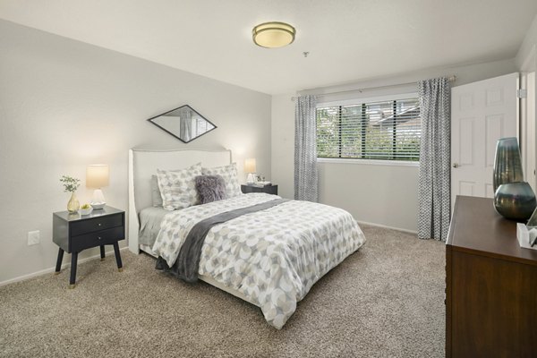 Cozy bedroom with modern furnishings at Skyview 3322 Apartments