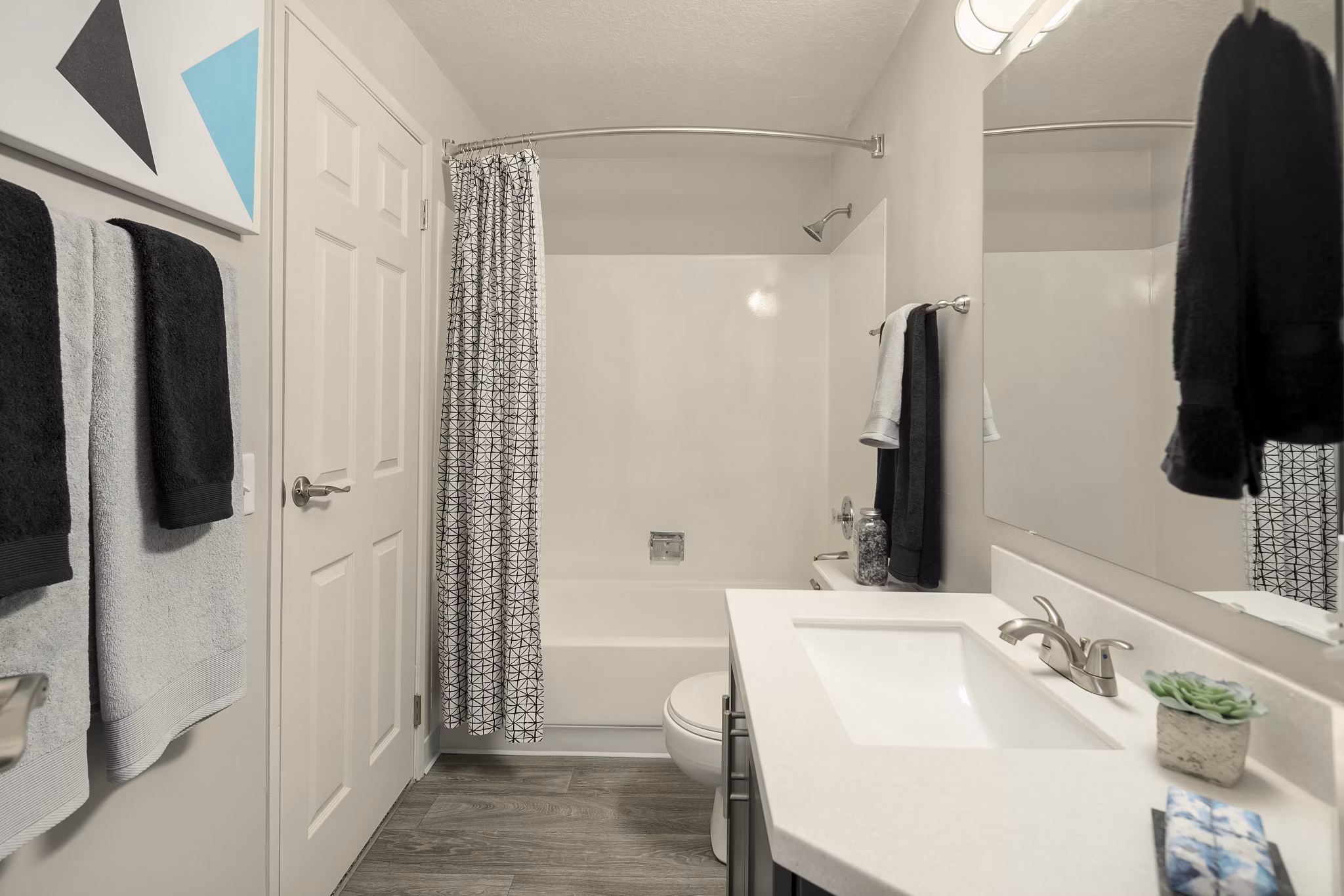 Modern bathroom with sleek fixtures at Skyview 3322 Apartments