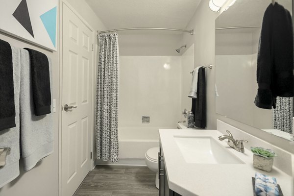 Modern bathroom with sleek fixtures at Skyview 3322 Apartments