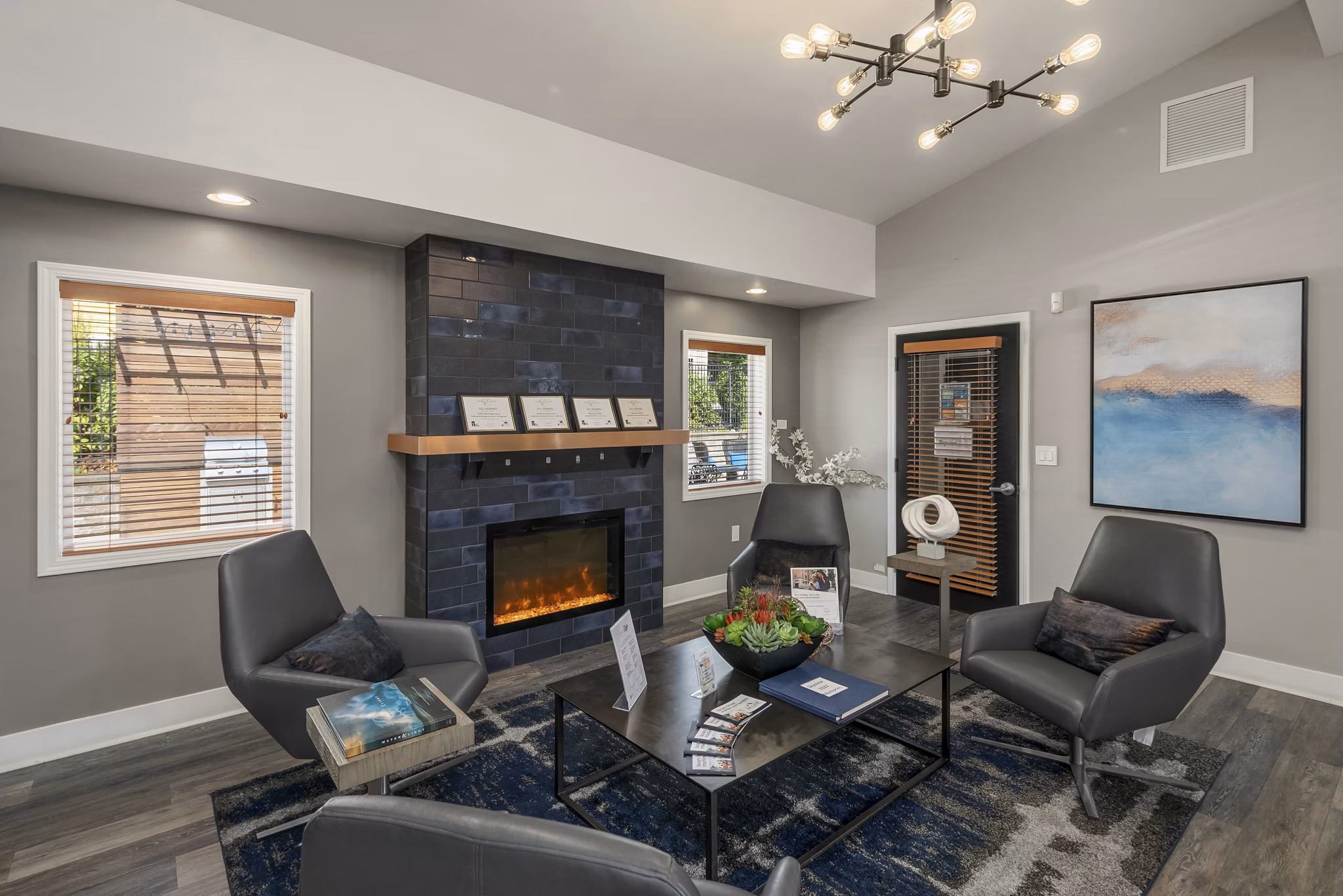 Clubhouse with modern design and plush seating at Skyview 3322 Apartments