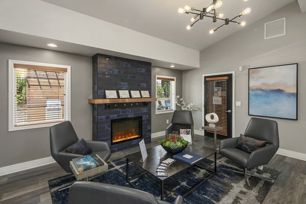 Clubhouse with modern design and plush seating at Skyview 3322 Apartments