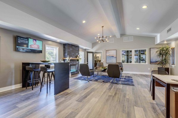 Modern clubhouse featuring comfortable seating and entertainment areas at Skyview 3322 Apartments luxury community