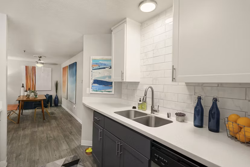 Skyview 3322 Apartments: Modern kitchen with stainless steel appliances and granite countertops