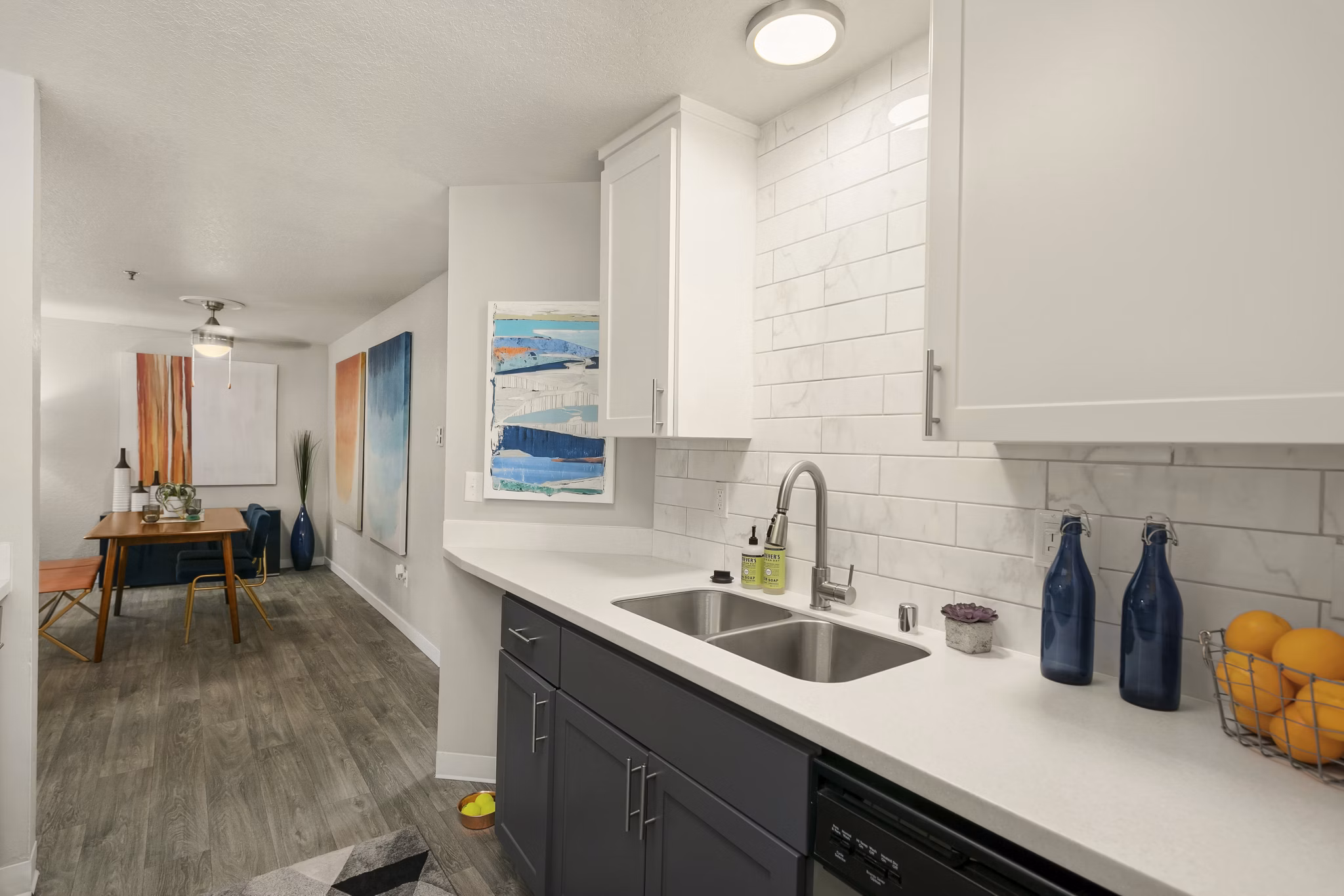 Skyview 3322 Apartments: Modern kitchen with stainless steel appliances and granite countertops