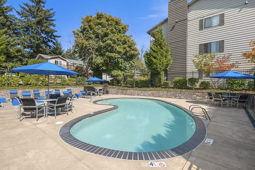 Luxurious pool area at Skyview 3322 Apartments with loungers and modern design