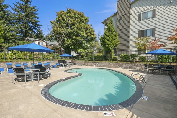 Luxurious pool area at Skyview 3322 Apartments with loungers and modern design