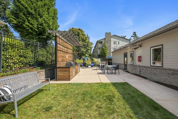 Spacious outdoor patio with modern furniture at Skyview 3322 Apartments, perfect for relaxation and gatherings