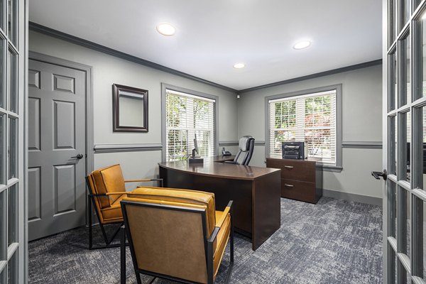 Clubhouse with modern furnishings at North Forest Apartments, ideal for socializing and relaxation in a luxurious setting