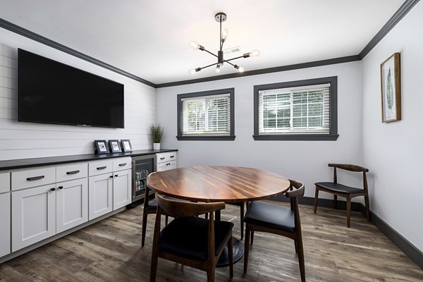 North Forest Apartments: Elegant clubhouse featuring stylish interior design and comfortable seating areas