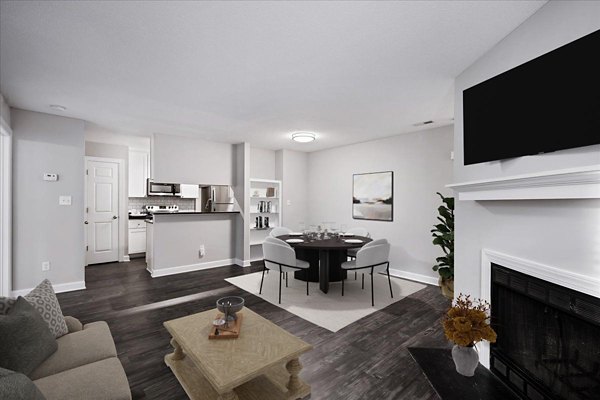 Living room with contemporary furnishings at North Forest Apartments, a luxury Greystar property