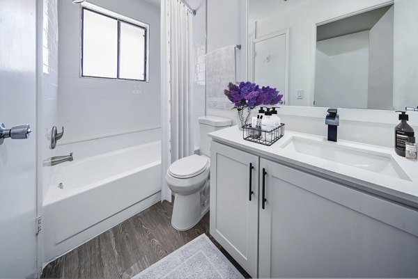 Modern bathroom with sleek fixtures at Cielo Point Apartments, featuring luxury finishes and spacious design