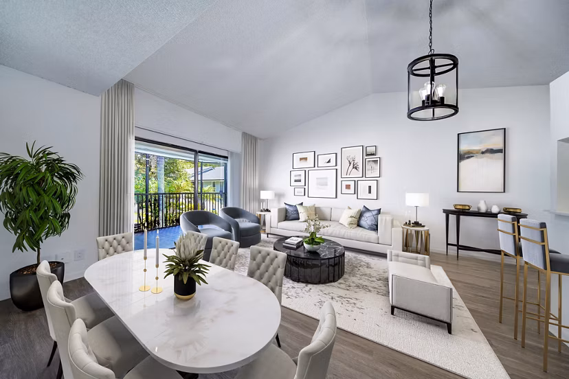 Spacious living room with modern decor and large windows at Cielo Point Apartments