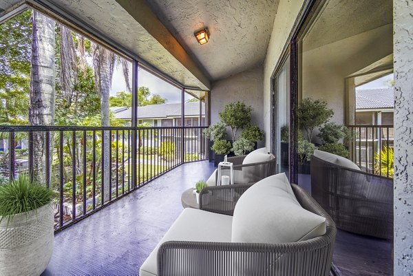Private patio with modern outdoor seating at Cielo Point Apartments, perfect for relaxing with stunning views