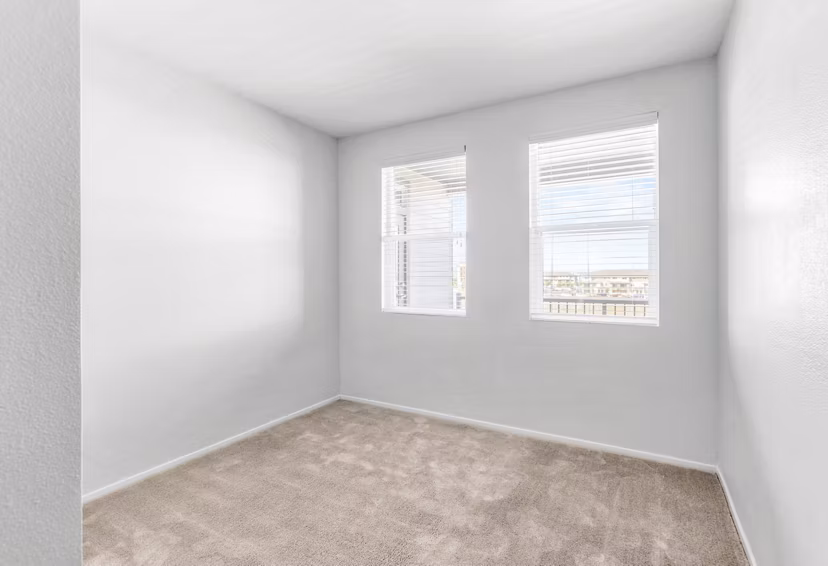 Cozy bedroom with modern decor at The Element Apartments, ideal for luxury living