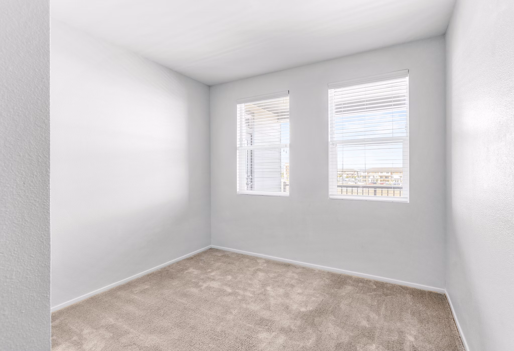 Cozy bedroom with modern decor at The Element Apartments, ideal for luxury living