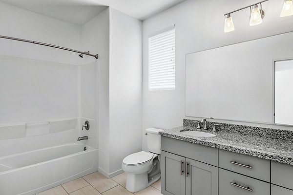 Modern bathroom with sleek fixtures at The Element Apartments