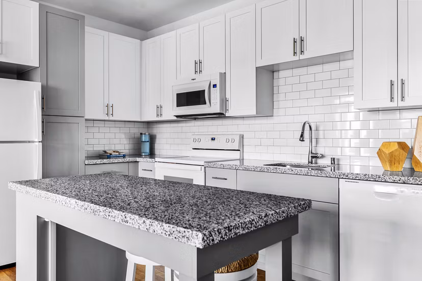 Modern kitchen featuring stainless steel appliances at The Element Apartments