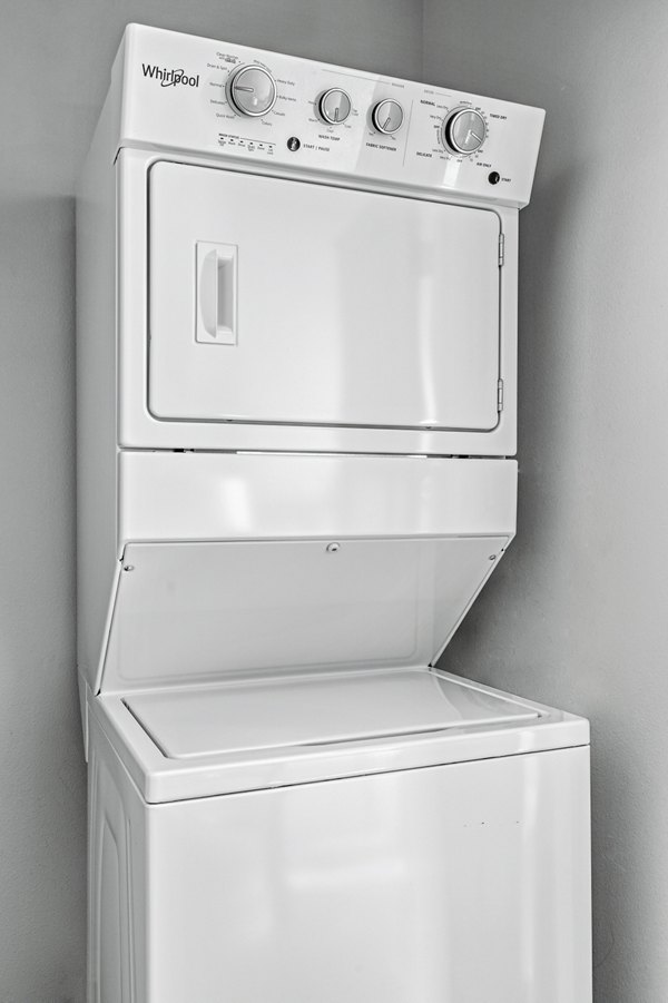 Laundry room with modern appliances at The Element Apartments in Charlotte