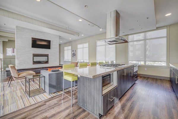 Clubhouse featuring modern lounge and entertainment areas at The Calo Apartments