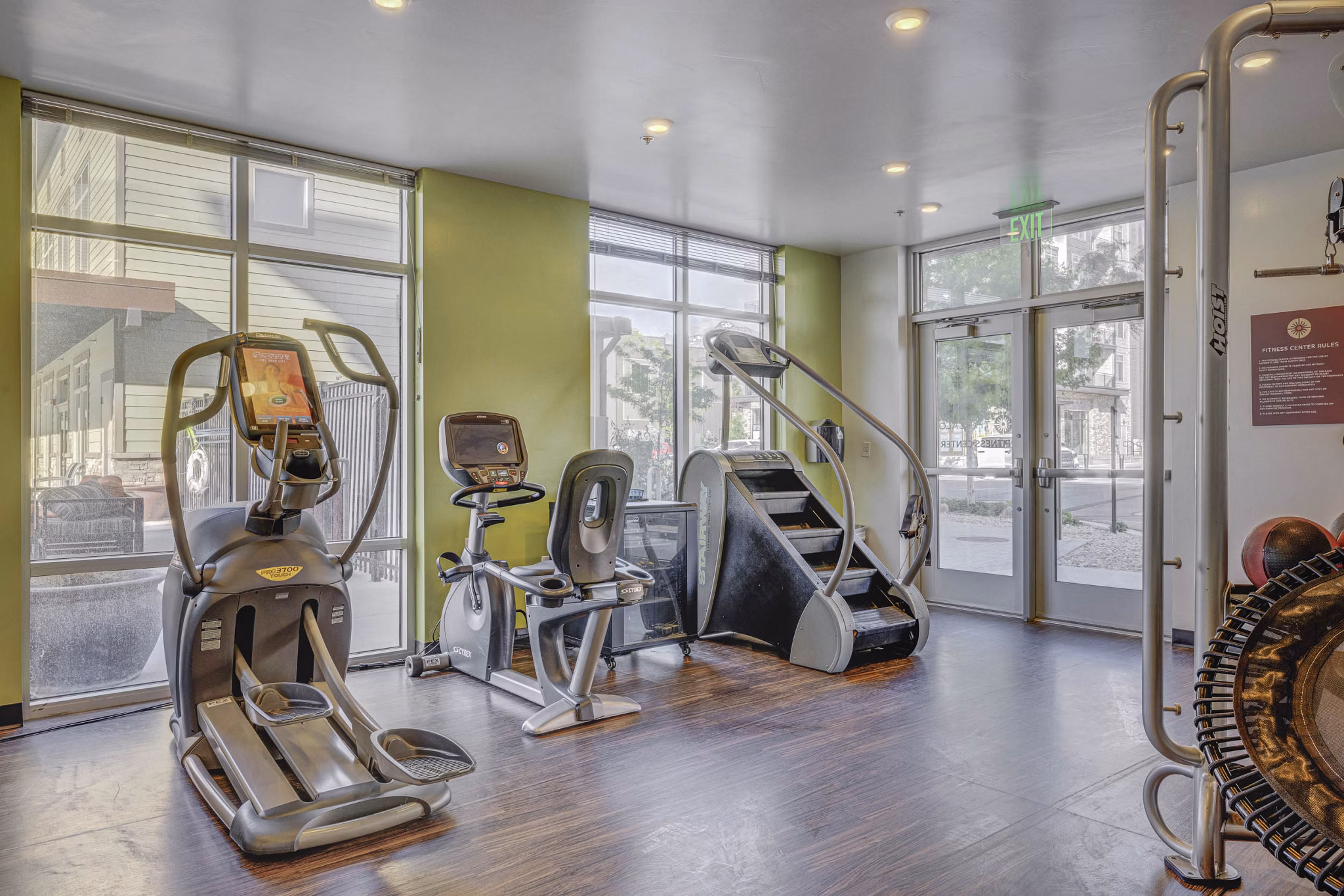 Modern fitness center with state-of-the-art equipment at The Calo Apartments offering luxury amenities for active lifestyles