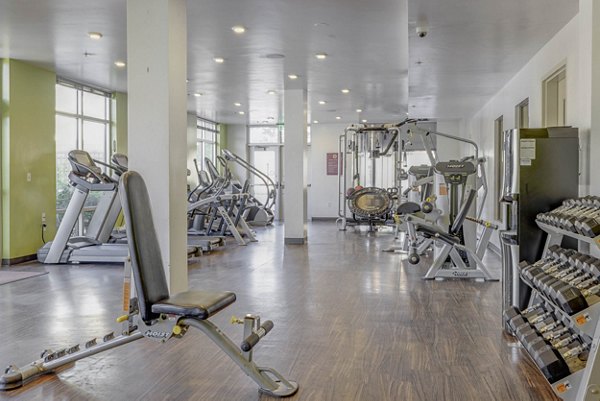 Fitness center featuring modern equipment at The Calo Apartments fitness center
