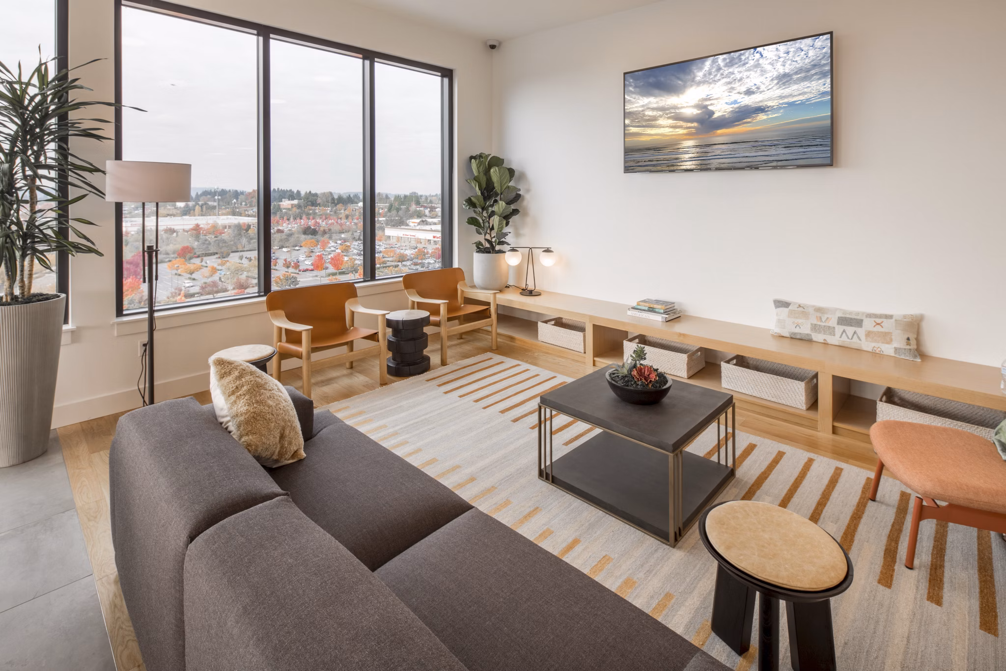 Clubhouse with modern decor and spacious seating at The Overland Apartments