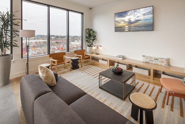 Clubhouse with modern decor and spacious seating at The Overland Apartments