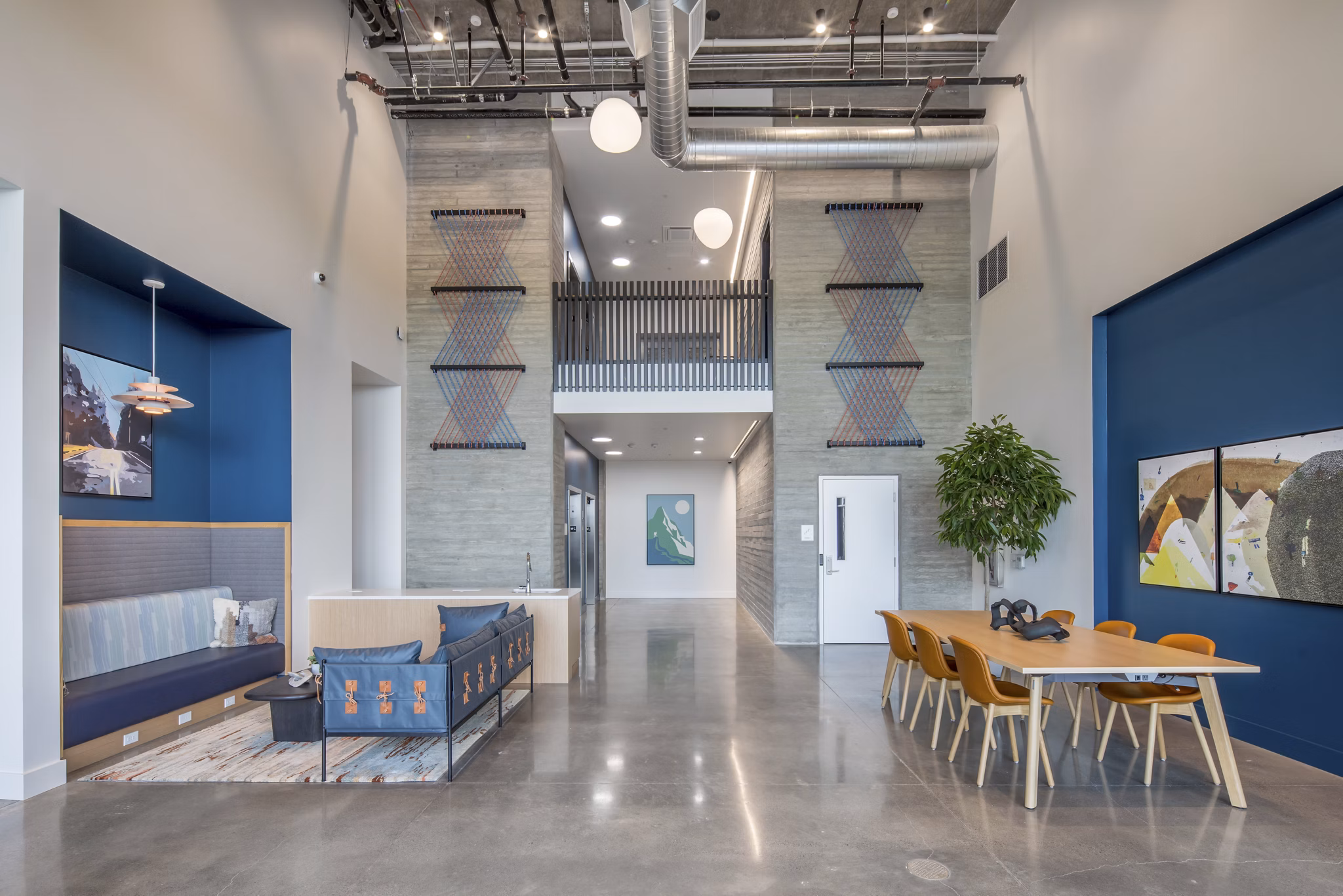Stylish clubhouse with modern decor at The Overland Apartments, a luxury living community by Greystar