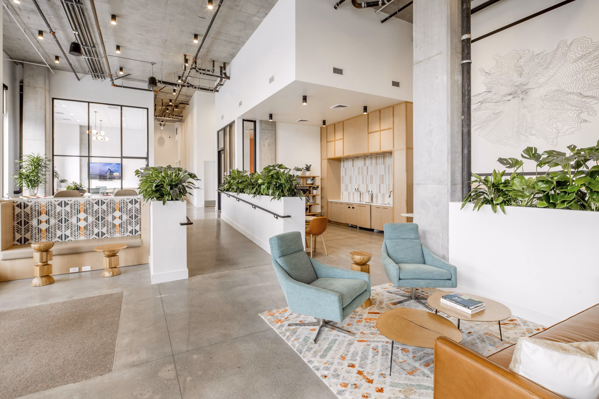 Clubhouse featuring modern design and comfortable seating at The Overland Apartments