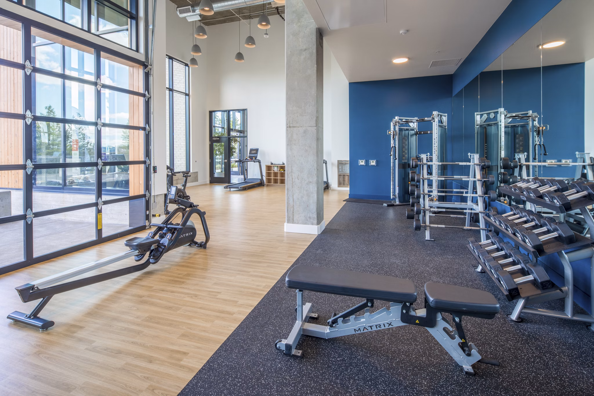 State-of-the-art fitness center with modern equipment at The Overland Apartments, ideal for active residents seeking luxury living