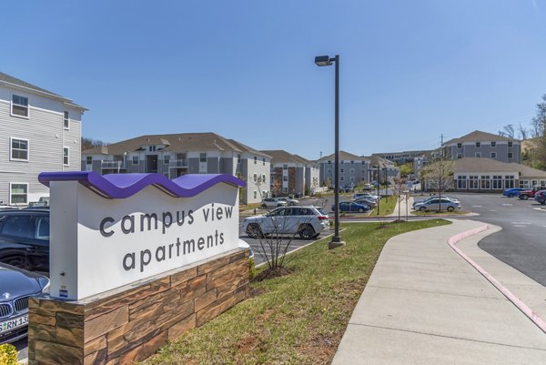 Campus View Apartments: Modern signage at this luxury housing community near campus