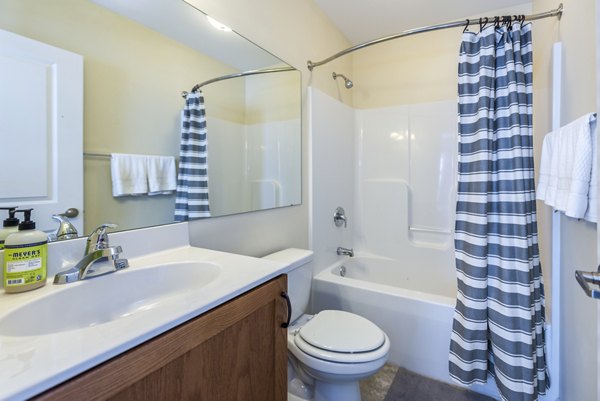 Modern bathroom with sleek fixtures at Campus View Apartments